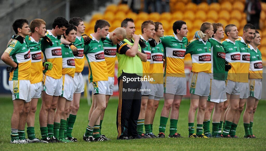 30 June 2010; Offaly manager Ken Kellaghan stands with his players for the national anthem. ESB Leinster GAA Football Minor Championship Semi-Final, Offaly v Laois, O'Connor Park, Tullamore, Co. Offaly. Picture credit: Brian Lawless / SPORTSFILE