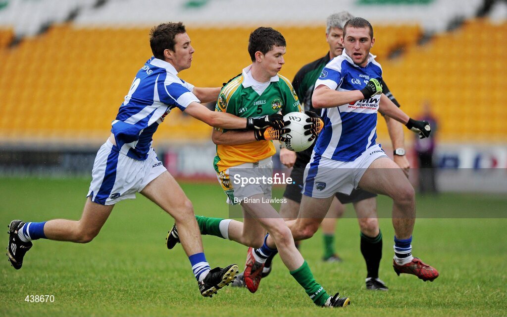 30 June 2010; Stephen Hannon, Offaly, in action against Brian Kenna and Dale Byrne, Laois. ESB Leinster GAA Football Minor Championship Semi-Final, Offaly v Laois, O'Connor Park, Tullamore, Co. Offaly. Picture credit: Brian Lawless / SPORTSFILE