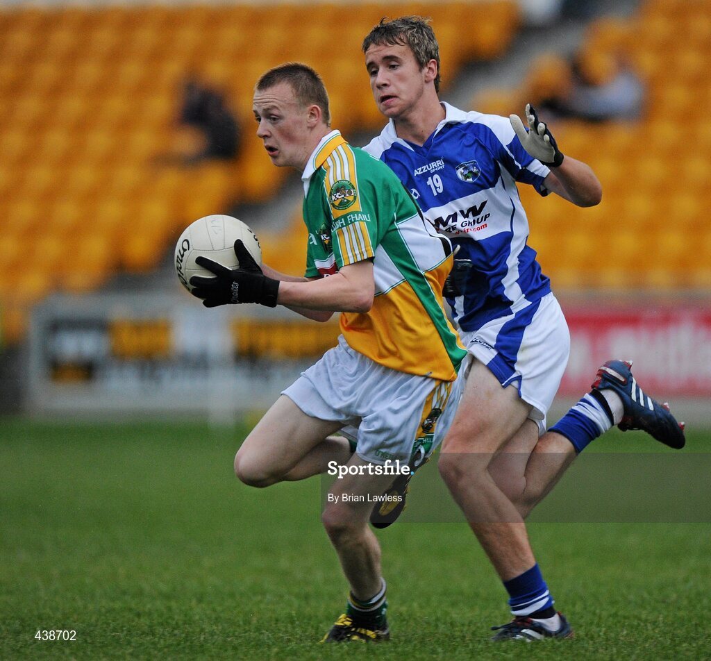 30 June 2010; Peter Cunningham, Offaly, in action against Niall Mullen, Laois. ESB Leinster GAA Football Minor Championship Semi-Final, Offaly v Laois, O'Connor Park, Tullamore, Co. Offaly. Picture credit: Brian Lawless / SPORTSFILE