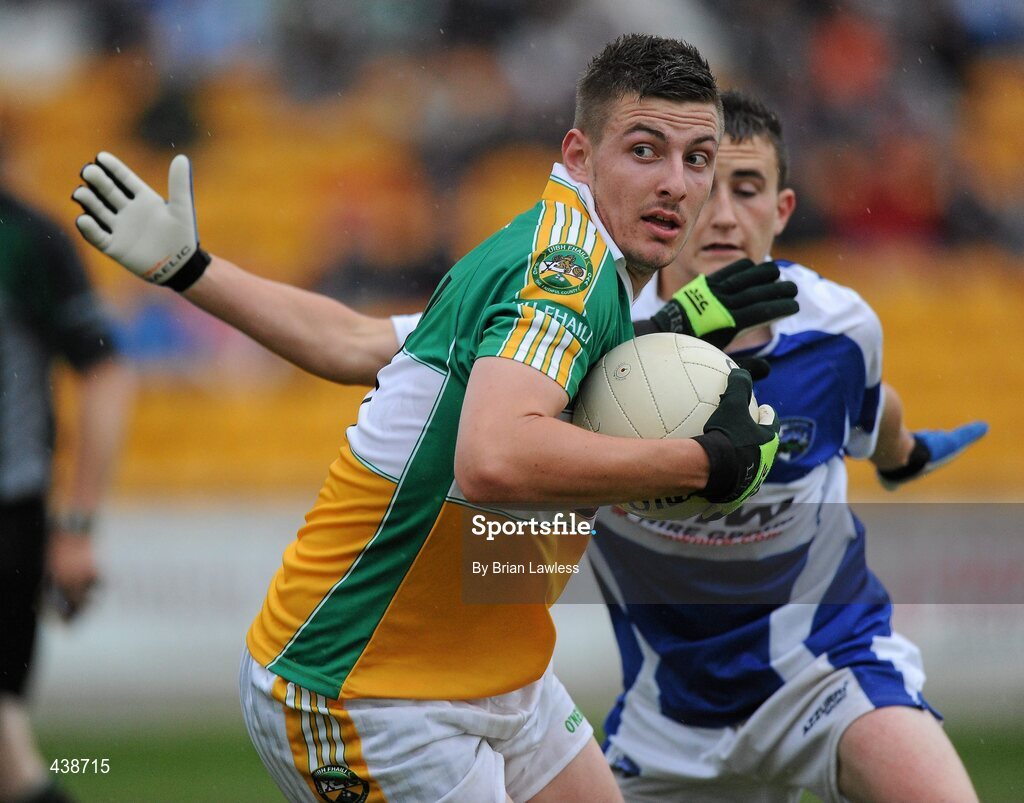 30 June 2010; Derek Kelly, Offaly, in action against Shane McCauley, Laois. ESB Leinster GAA Football Minor Championship Semi-Final, Offaly v Laois, O'Connor Park, Tullamore, Co. Offaly. Picture credit: Brian Lawless / SPORTSFILE