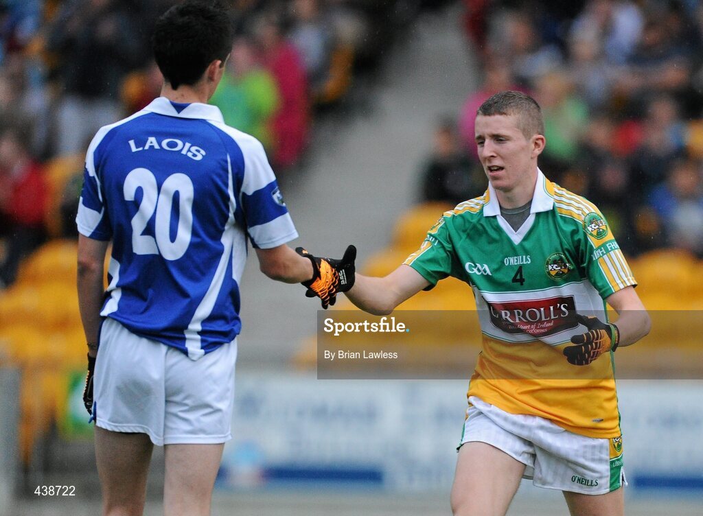 30 June 2010; Offaly's Cian Donohoe shakes hands with Jason Campion, Laois, after Offaly's victory. ESB Leinster GAA Football Minor Championship Semi-Final, Offaly v Laois, O'Connor Park, Tullamore, Co. Offaly. Picture credit: Brian Lawless / SPORTSFILE
