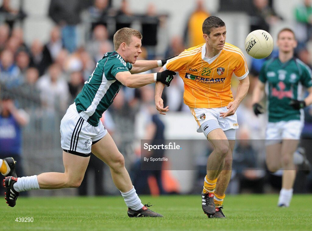 3 July 2010; Sean Kelly, Antrim, in action against Morgan O'Flaherty, Kildare. GAA Football All-Ireland Senior Championship Qualifier Round 1 Replay, Antrim v Kildare, Casement Park, Belfast, Co. Antrim. Photo by Sportsfile