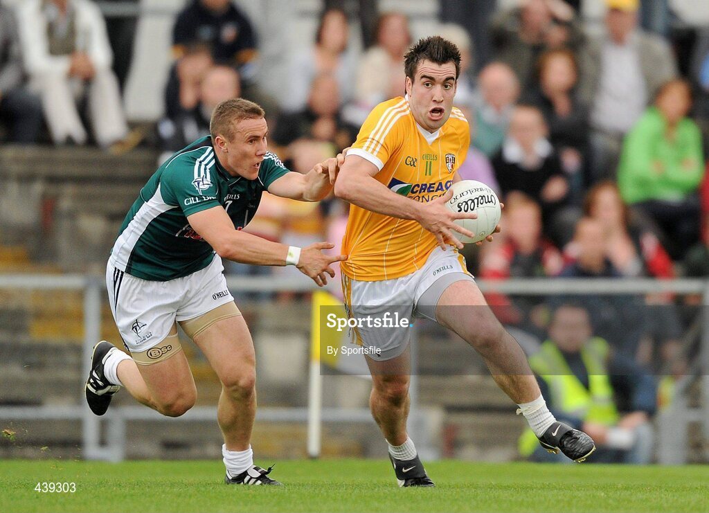 3 July 2010; Kevin Niblock, Antrim, in action against Brian Flanagan, Kildare. GAA Football All-Ireland Senior Championship Qualifier Round 1 Replay, Antrim v Kildare, Casement Park, Belfast, Co. Antrim. Photo by Sportsfile
