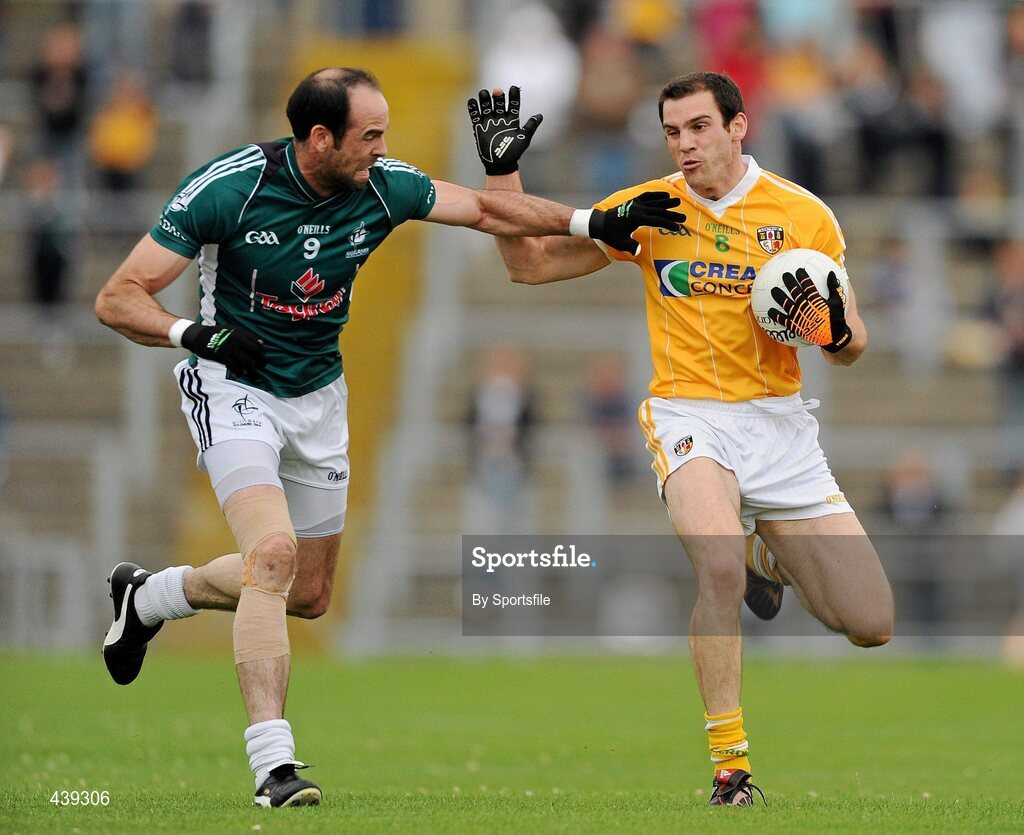 3 July 2010; Brendan Herron, Antrim, in action against Dermot Earley, Kildare. GAA Football All-Ireland Senior Championship Qualifier Round 1 Replay, Antrim v Kildare, Casement Park, Belfast, Co. Antrim. Photo by Sportsfile