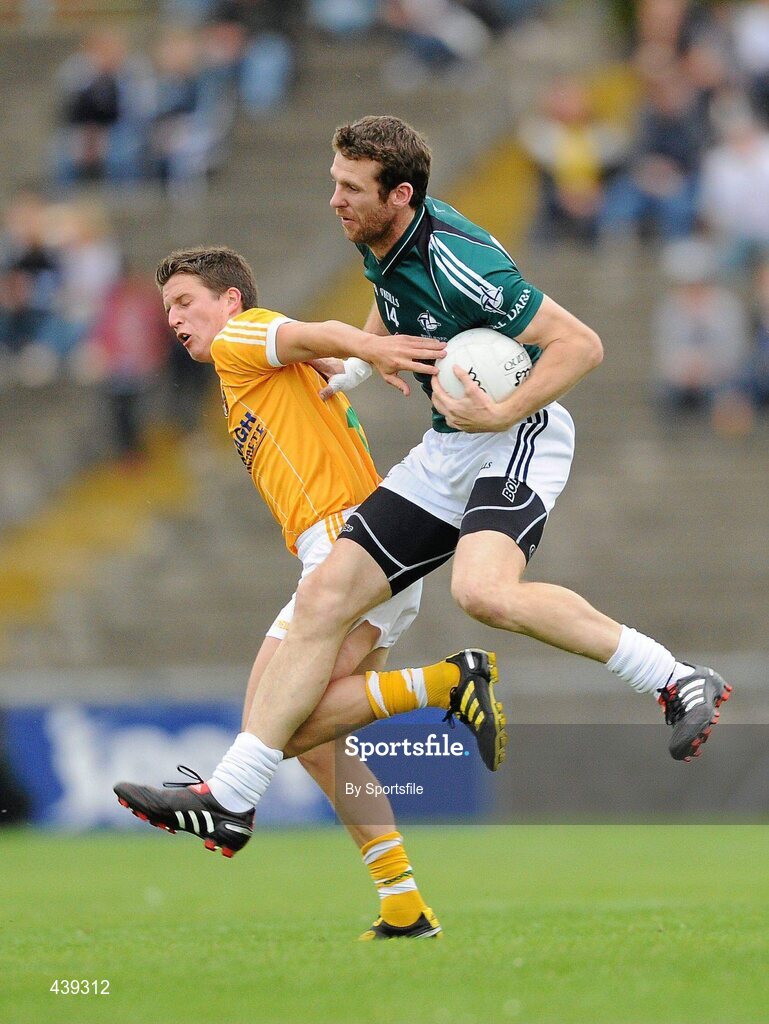 3 July 2010; Ronan Sweeney, Kildare, in action against Thomas McCann, Antrim. GAA Football All-Ireland Senior Championship Qualifier Round 1 Replay, Antrim v Kildare, Casement Park, Belfast, Co. Antrim. Photo by Sportsfile