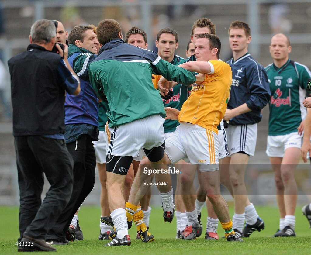 3 July 2010; Kildare manager Kieran McGeeney intervenes in a row between William Heffernan, Kildare and Michael McCann, Antrim, at the end of the game. GAA Football All-Ireland Senior Championship Qualifier Round 1 Replay, Antrim v Kildare, Casement Park, Belfast, Co. Antrim. Photo by Sportsfile