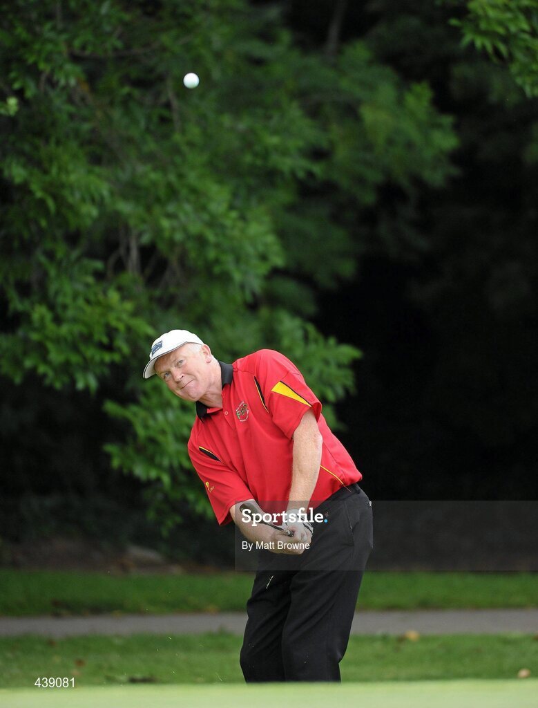 2 July 2010; Former Dublin footballer Barney Rock, from Stabannon Gaels GAA Club, pitches onto the first green during the FBD All-Ireland GAA Golf Challenge 2010 Leinster Final. Palmerstown House Golf Club, Co. Kildare. Picture credit: Matt Browne / SPORTSFILE