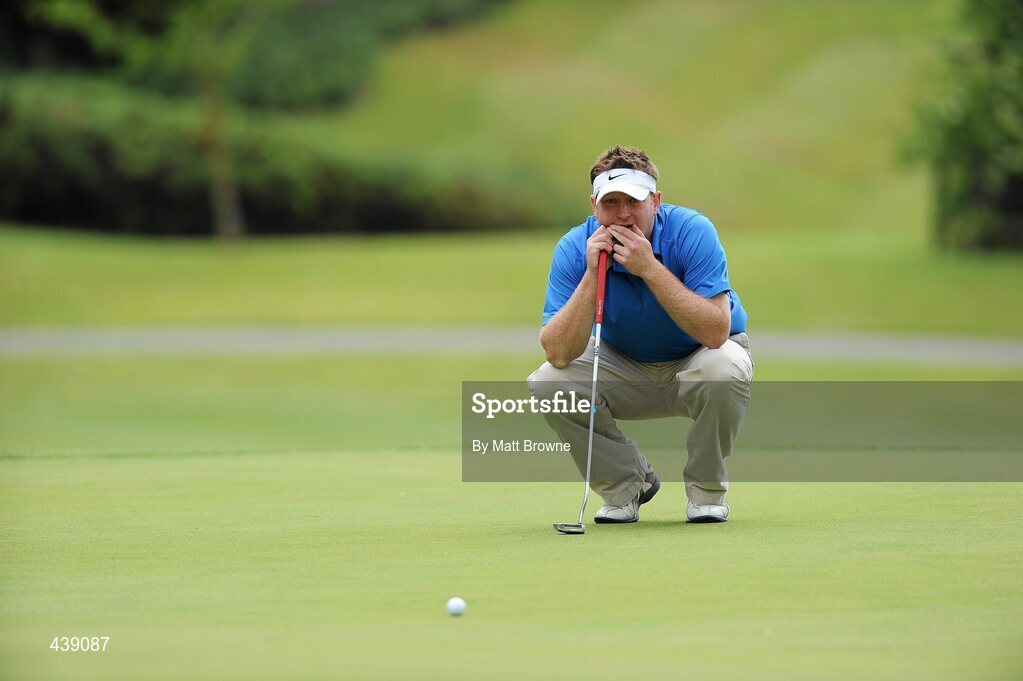 2 July 2010; Cian O'Mahony, from Brigid's GAA Club, Dublin, lines up his putt on the 9th green during the FBD All-Ireland GAA Golf Challenge 2010 Leinster Final. Palmerstown House Golf Club, Co. Kildare. Picture credit: Matt Browne / SPORTSFILE