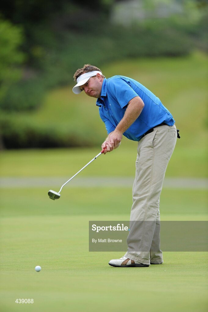 2 July 2010; Cian O'Mahony, from Brigid's GAA Club, Dublin, watches his putt on the 9th green during the FBD All-Ireland GAA Golf Challenge 2010 Leinster Final. Palmerstown House Golf Club, Co. Kildare. Picture credit: Matt Browne / SPORTSFILE
