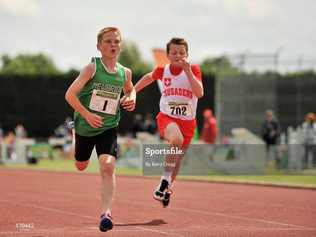 3 July 2010; Luke Morissey, Newbridge, Co. Kildare, crosses the line ahead of Alan Francis, Crusaders, to win the U-12 Boy's 60m Final, during the Woodie's DIY AAI Juvenile Track & Field Championships. Tullamore Harriers Stadium, Tullamore, Co. Offaly. Picture credit: Barry Cregg / SPORTSFILE