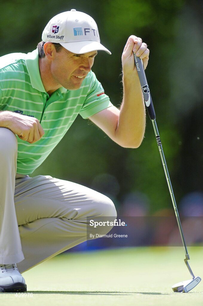 5 July 2010; Padraig Harrington lines up his putt on the 13th green during the JP McManus Invitational Pro-Am. Adare Manor, Adare, Co. Limerick. Picture credit: Diarmuid Greene / SPORTSFILE