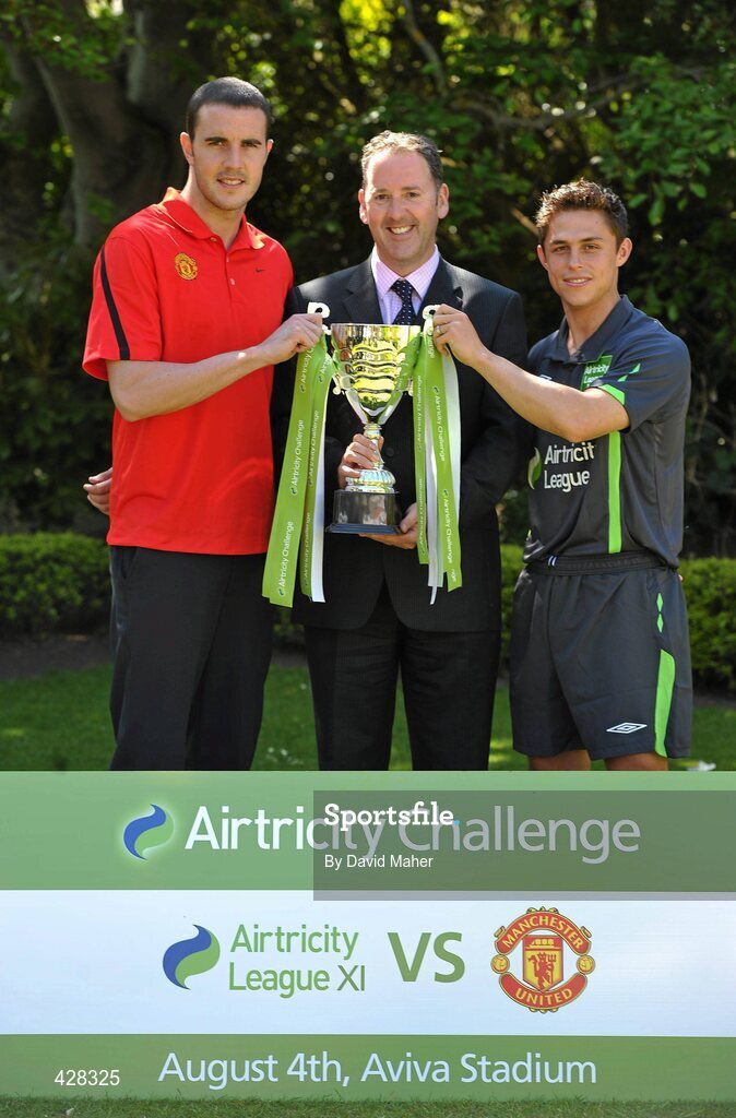 8 July 2010; Manchester United and Republic of Ireland International John O'Shea with St. Patrick's Athletic's Ryan Guy and Airtricity Supply Managing Director Kevin Greenhorn pictured at the ticket launch for the Airtricity Challenge on Wednesday August 4th when a representative Airtricity League XI takes on Manchester United at the Aviva Stadium. The Airtricity Challenge will be the first historic match in the new stadium. Portmarnock Hotel and Golf Links, Portmarnock, Co. Dublin. Picture credit: David Maher / SPORTSFILE