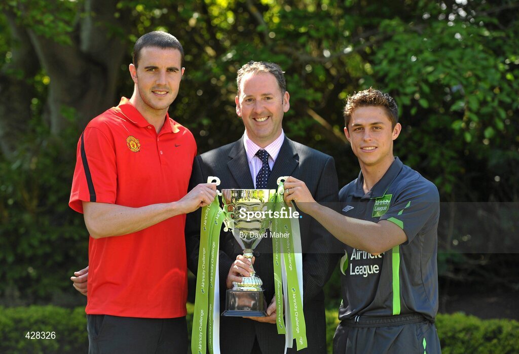 8 July 2010; Manchester United and Republic of Ireland International John O'Shea with St. Patrick's Athletic's Ryan Guy and Airtricity Supply Managing Director Kevin Greenhorn pictured at the ticket launch for the Airtricity Challenge on Wednesday August 4th when a representative Airtricity League XI takes on Manchester United at the Aviva Stadium. The Airtricity Challenge will be the first historic match in the new stadium. Portmarnock Hotel and Golf Links, Portmarnock, Co. Dublin. Picture credit: David Maher / SPORTSFILE