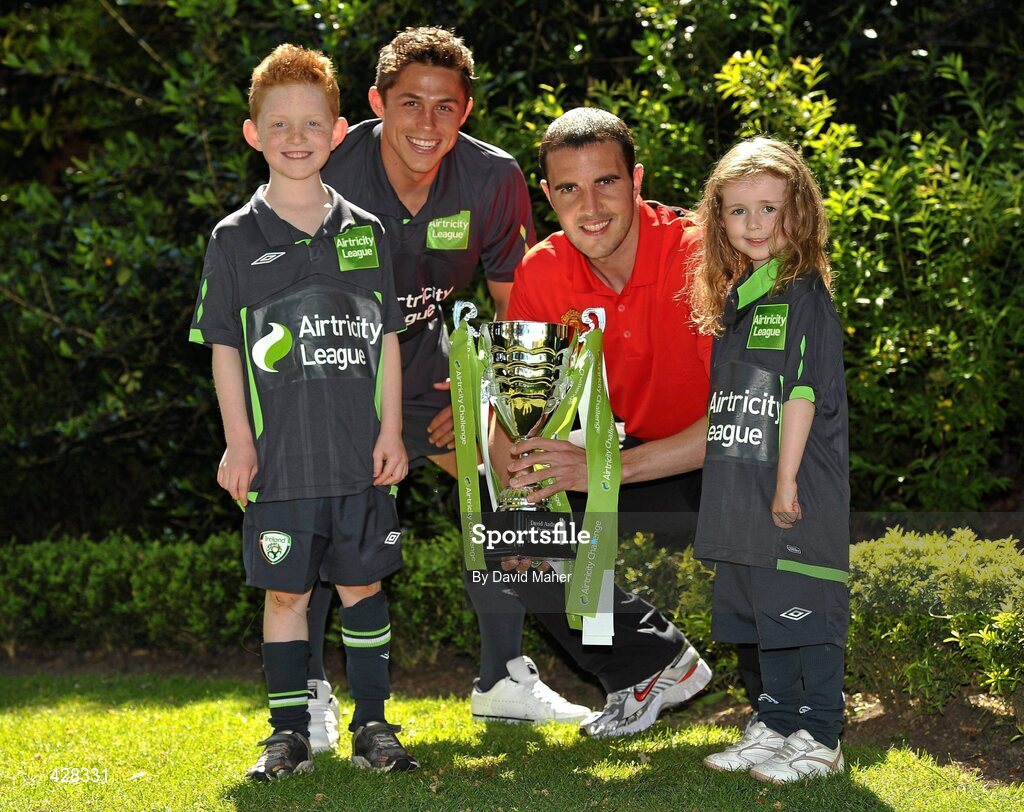 8 July 2010; Manchester United and Republic of Ireland International John O'Shea and St. Patrick's Athletic's Ryan Guy, with Sophie Cooke, age 4 and Dylan Ryan, age 8, both from Bray, Co. Wicklow, pictured at the ticket launch for the Airtricity Challenge on Wednesday August 4th when a representative Airtricity League XI takes on Manchester United at the Aviva Stadium. The Airtricity Challenge will be the first historic match in the new stadium. Portmarnock Hotel and Golf Links, Portmarnock, Co. Dublin. Picture credit: David Maher / SPORTSFILE