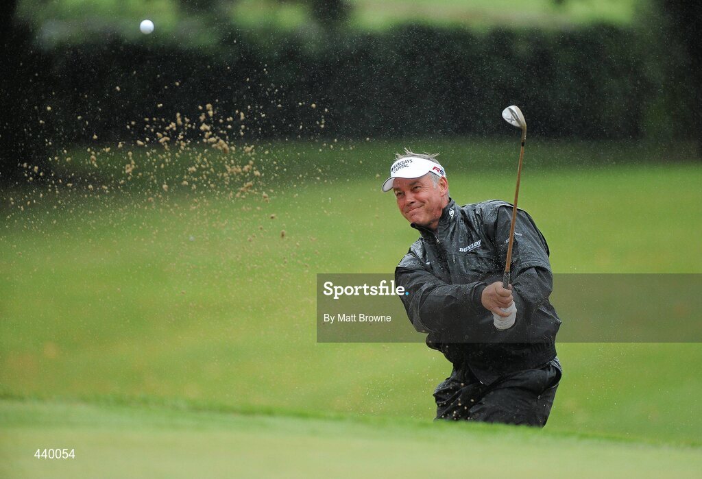 6 July 2010; Darren Clarke plays from the bunker onto the 12th green during the JP McManus Invitational Pro-Am. Adare Manor, Co. Limerick. Picture credit: Matt Browne / SPORTSFILE