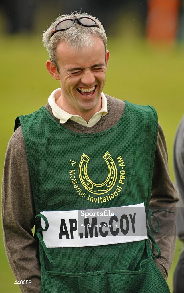 6 July 2010; Ruby Walsh, caddy for Tony McCoy, laughs after a shot by Tony McCoy on the 5th green during the JP McManus Invitational Pro-Am. Adare Manor, Adare, Co. Limerick. Picture credit: Diarmuid Greene / SPORTSFILE
