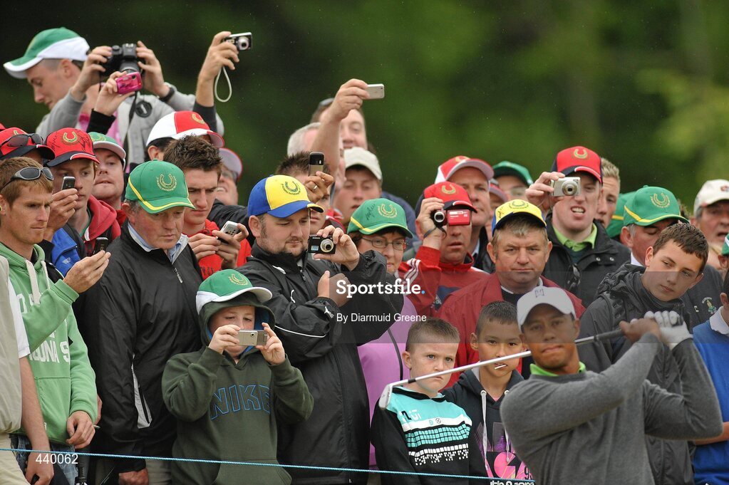 6 July 2010; Spectators watch Tiger Woods as he watches his second shot on the 8th hole during the JP McManus Invitational Pro-Am. Adare Manor, Adare, Co. Limerick. Picture credit: Diarmuid Greene / SPORTSFILE