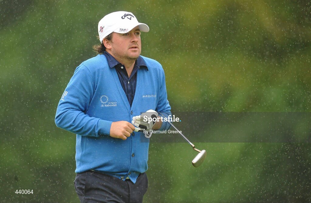 6 July 2010; Graeme McDowell on the 9th green as rain starts to fall during the JP McManus Invitational Pro-Am. Adare Manor, Adare, Co. Limerick. Picture credit: Diarmuid Greene / SPORTSFILE
