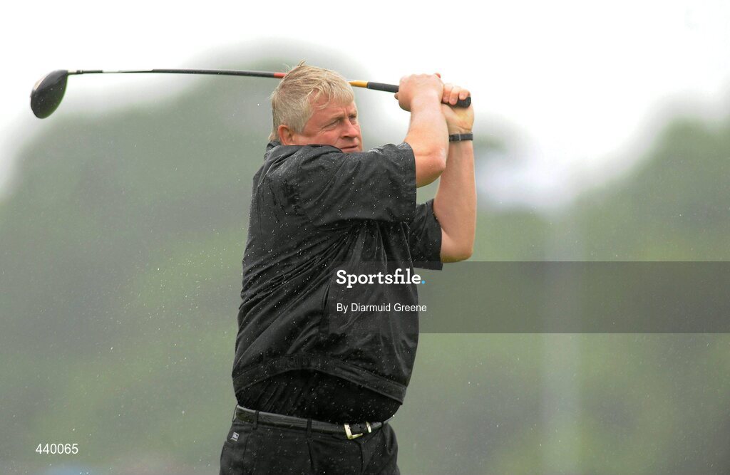 6 July 2010; Denis O'Brien watches his drive on the 10th tee box during the JP McManus Invitational Pro-Am. Adare Manor, Adare, Co. Limerick. Picture credit: Diarmuid Greene / SPORTSFILE