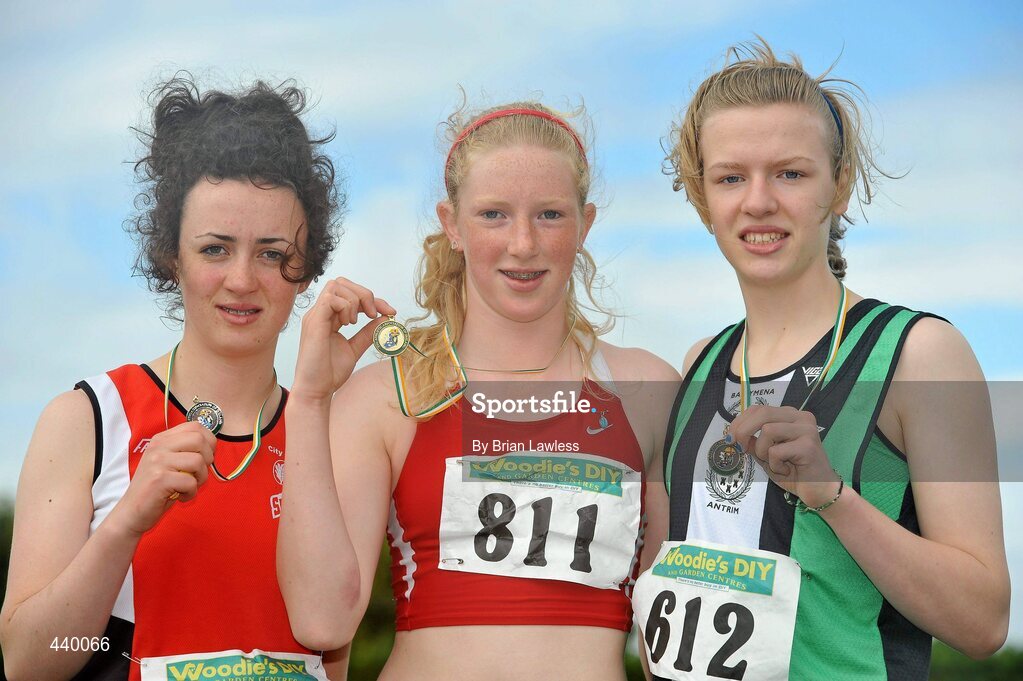 4 July 2010; Winner of the U16 Girl's Long Jump Sarah McCarthy, Fingallians, centre, with second place Roisin Laverty, City of Derry, left, and third place Heather Carson, Ballymena & Antrim, during the Woodie's DIY AAI Juvenile Track & Field Championships. Tullamore Harriers Stadium, Tullamore, Co. Offaly. Picture credit: Brian Lawless / SPORTSFILE