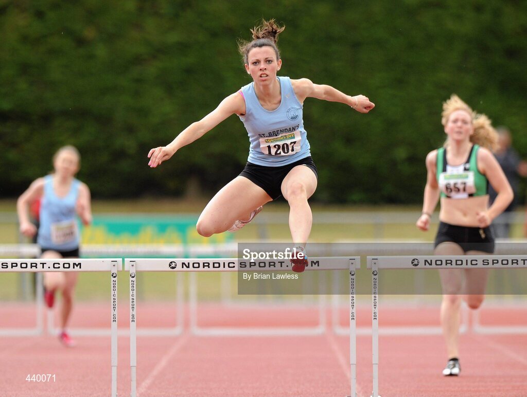 4 July 2010; Ailbhe Courtney, St. Brendan's, on her way to winning the U19 Girl's 400m Hurdles Final, during the Woodie's DIY AAI Juvenile Track & Field Championships. Tullamore Harriers Stadium, Tullamore, Co. Offaly. Picture credit: Brian Lawless / SPORTSFILE