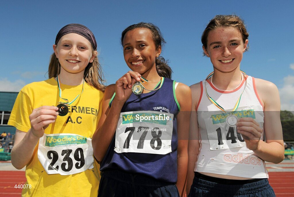 4 July 2010; Winner of the U13 Girl's 600m Nadia Power, Templeogue, centre, with second place, Dearbhaile Beirne, Mohill, right, and third place Rose Finnegan, Bohermeen, during the Woodie's DIY AAI Juvenile Track & Field Championships. Tullamore Harriers Stadium, Tullamore, Co. Offaly. Picture credit: Brian Lawless / SPORTSFILE
