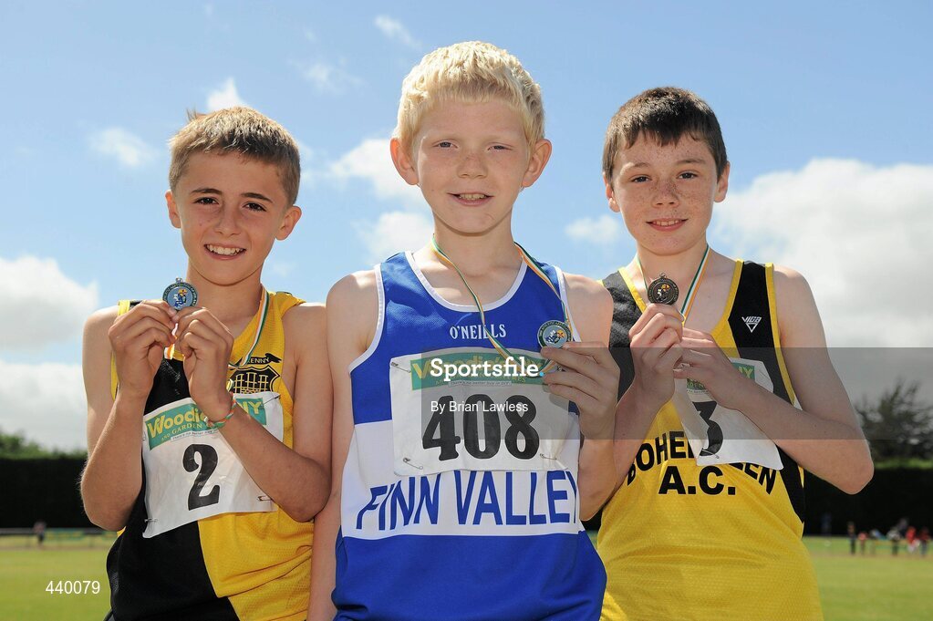 4 July 2010; Winnner of the U12 Boy's 600m Denver Kelly, Finn Valley, centre, with second place Luke Fitzsimons, Kilkenny City Harriers, left, and third place Alan Monaghan, Bohermeen, during the Woodie's DIY AAI Juvenile Track & Field Championships. Tullamore Harriers Stadium, Tullamore, Co. Offaly. Picture credit: Brian Lawless / SPORTSFILE