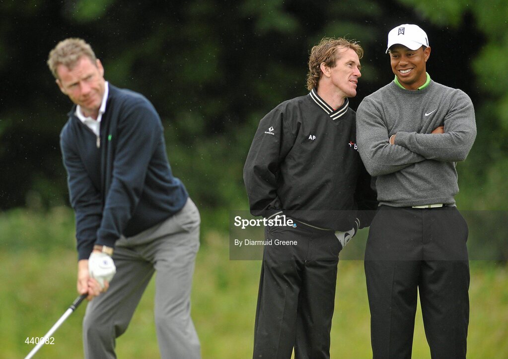 6 July 2010; Tony McCoy and Tiger Woods, right, share a joke as Mick Fitzgerald prepares to tee off at the 9th tee box during the JP McManus Invitational Pro-Am. Adare Manor, Adare, Co. Limerick. Picture credit: Diarmuid Greene / SPORTSFILE