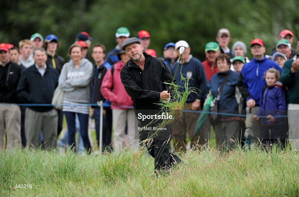 6 July 2010; Actor Aidan Quinn plays from the rough back onto the first fairway during the JP McManus Invitational Pro-Am. Adare Manor, Co. Limerick. Picture credit: Matt Browne / SPORTSFILE