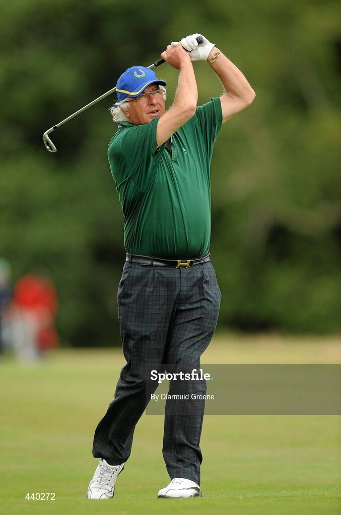 6 July 2010; John Magnier, Ireland's leading thoroughbred stud owner, watches his second shot on the 15th fairway during the JP McManus Invitational Pro-Am. Adare Manor, Adare, Co. Limerick. Picture credit: Diarmuid Greene / SPORTSFILE