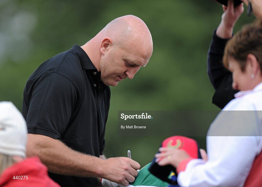 6 July 2010; Former Ireland rugby captain Keith Wood signs autographs on his way to the 16th tee box during the JP McManus Invitational Pro-Am. Adare Manor, Co. Limerick. Picture credit: Matt Browne / SPORTSFILE