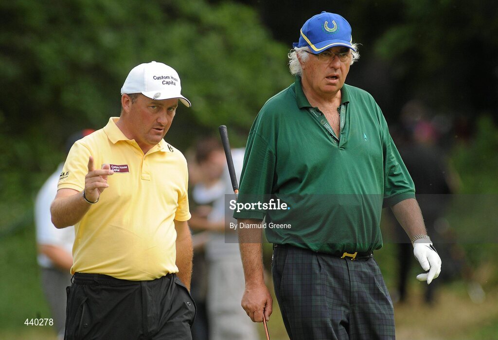 6 July 2010; Damien McGrane, left, with Ireland's leading thoroughbred stud owner John Magnier on their approach to the 14th green during the JP McManus Invitational Pro-Am. Adare Manor, Adare, Co. Limerick. Picture credit: Diarmuid Greene / SPORTSFILE