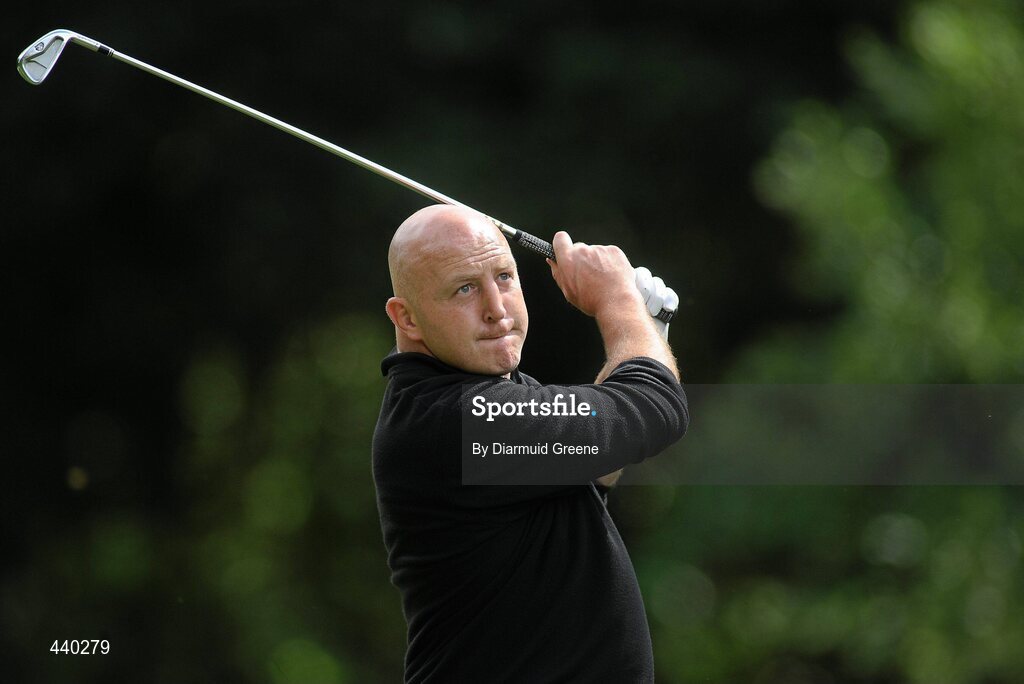 6 July 2010; Former Munster and Ireland rugby player Keith Wood watches his tee shot from the 14th tee box during the JP McManus Invitational Pro-Am. Adare Manor, Adare, Co. Limerick. Picture credit: Diarmuid Greene / SPORTSFILE
