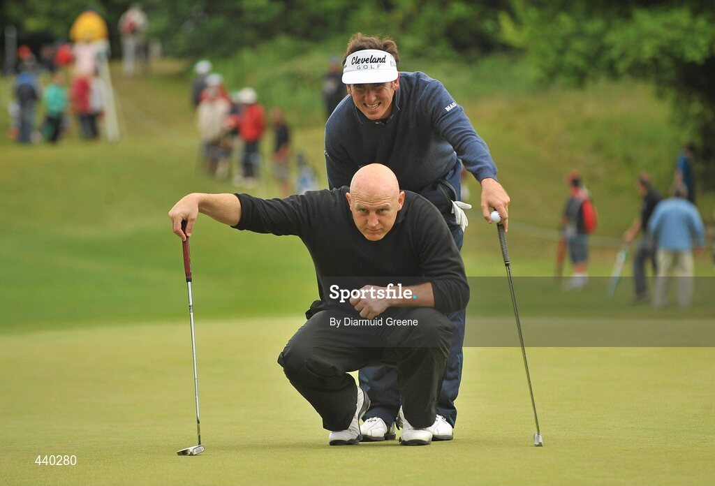 6 July 2010; Former Munster and Ireland rugby player Keith Wood, bottom, lines up his putt on the 13th green assisted by Gonzalo Fdez-Castano during the JP McManus Invitational Pro-Am. Adare Manor, Adare, Co. Limerick. Picture credit: Diarmuid Greene / SPORTSFILE