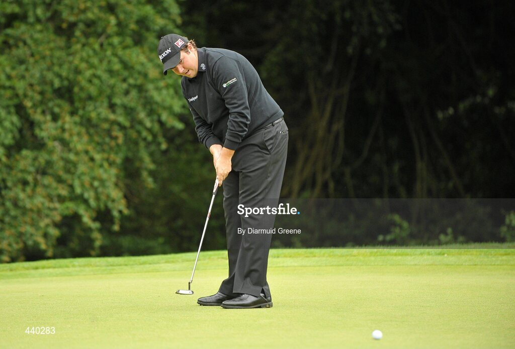 6 July 2010; Shane Lowry putts on the 13th green during the JP McManus Invitational Pro-Am. Adare Manor, Adare, Co. Limerick. Picture credit: Diarmuid Greene / SPORTSFILE
