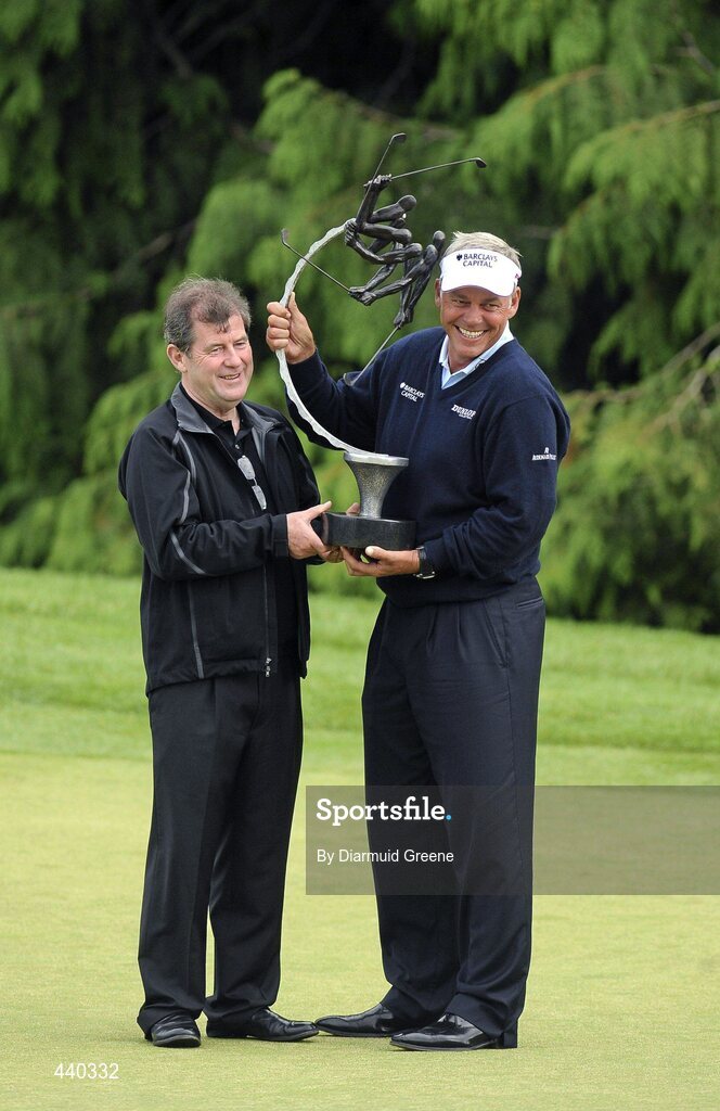 6 July 2010; Tournament winner Darren Clarke, right, is presented with his trophy by event host JP McManus after the JP McManus Invitational Pro-Am. Adare Manor, Adare, Co. Limerick. Picture credit: Diarmuid Greene / SPORTSFILE