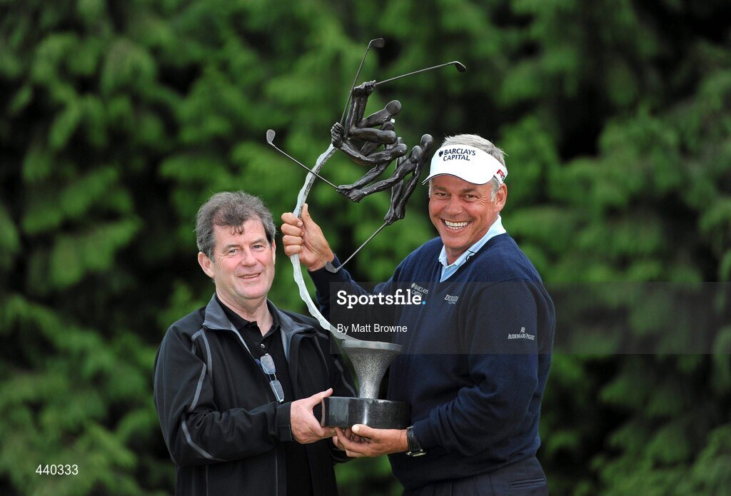 6 July 2010; Tournament winner Darren Clarke, right, is presented with his trophy by event host JP McManus after the JP McManus Invitational Pro-Am. Adare Manor, Adare, Co. Limerick. Picture credit: Matt Browne / SPORTSFILE