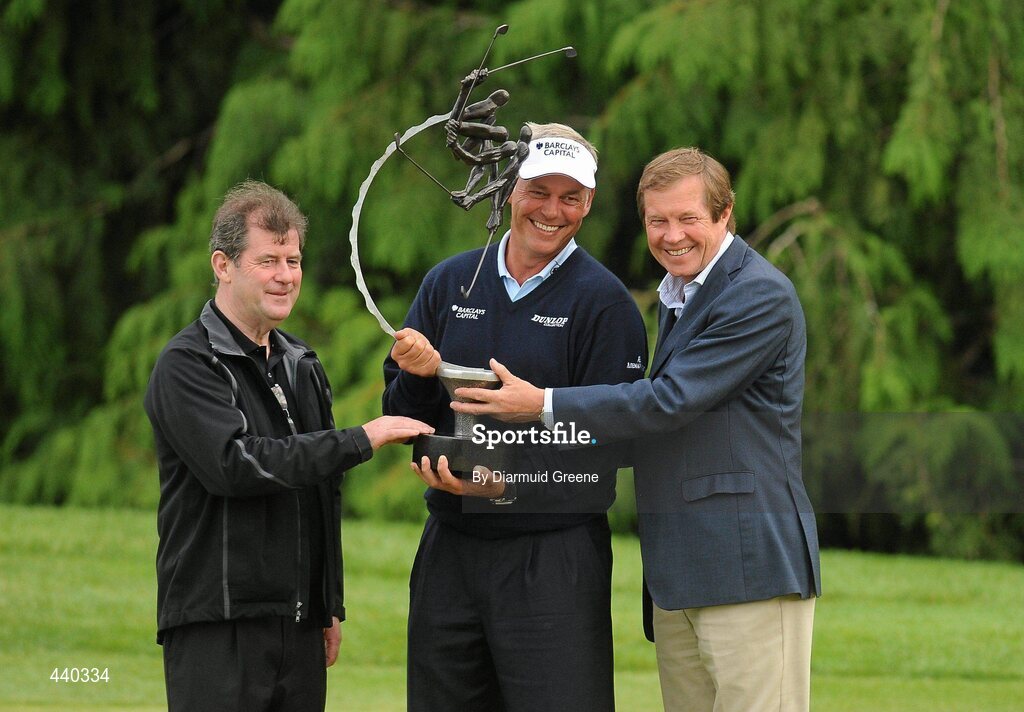 6 July 2010; Tournament winner Darren Clarke, centre, is presented with his trophy by event host JP McManus, left, and George O'Grady, Chief Executive of The European Tour, after the JP McManus Invitational Pro-Am. Adare Manor, Adare, Co. Limerick. Picture credit: Diarmuid Greene / SPORTSFILE