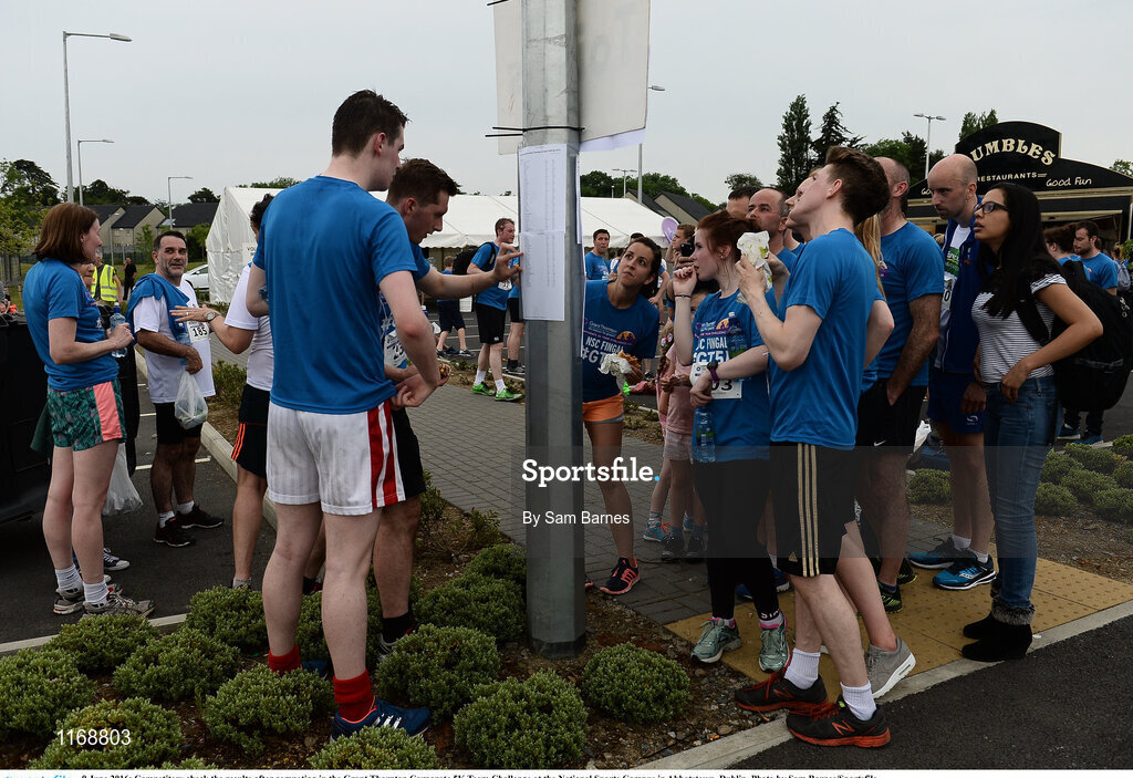 9 June 2016; Competitors check the results after competing in the Grant Thornton Corporate 5K Team Challenge at the National Sports Campus in Abbotstown, Dublin. Photo by Sam Barnes/Sportsfile