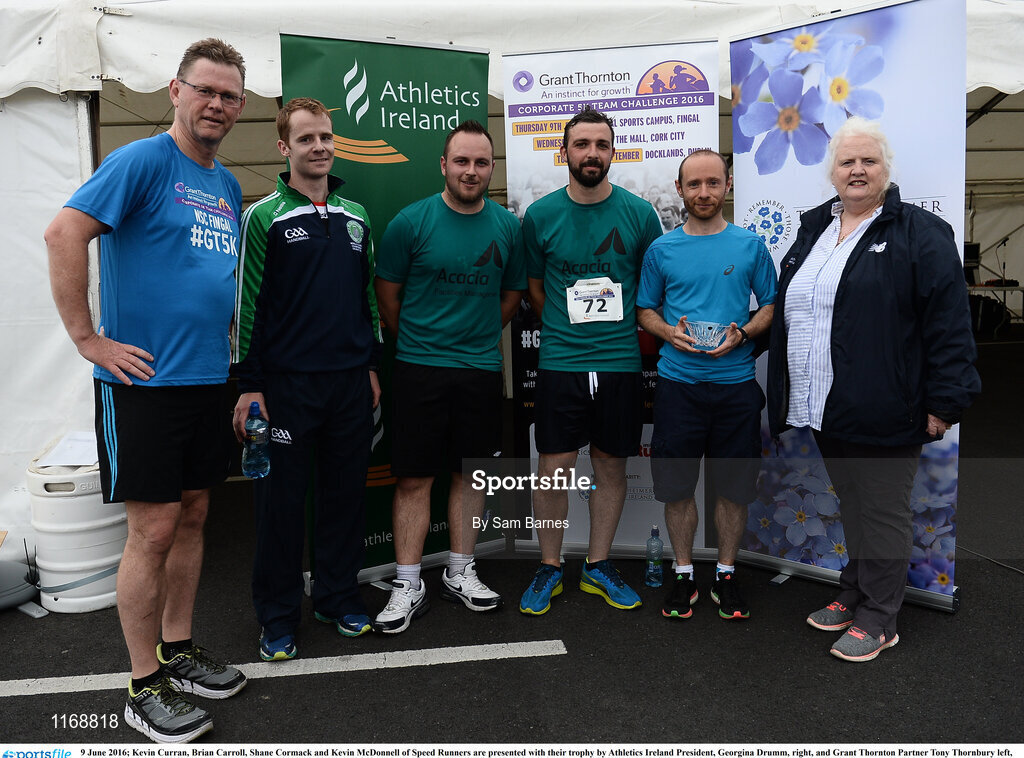 9 June 2016; Kevin Curran, Brian Carroll, Shane Cormack and Kevin McDonnell of Speed Runners are presented with their trophy by Athletics Ireland President, Georgina Drumm, right, and Grant Thornton Partner Tony Thornbury left, after winning third male team with a combined time of 1:28:43 at the Grant Thornton Corporate 5K Team Challenge at the National Sports Campus in Abbotstown, Dublin. Photo by Sam Barnes/Sportsfile