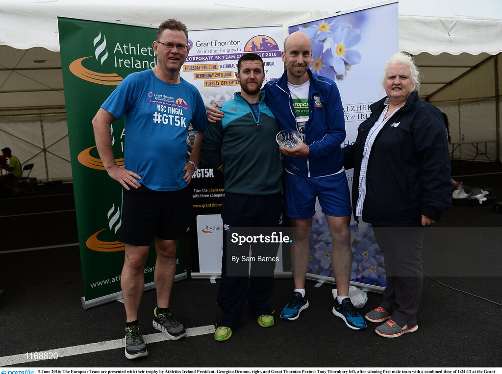 9 June 2016; The Europcar Team are presented with their trophy by Athletics Ireland President, Georgina Drumm, right, and Grant Thornton Partner Tony Thornbury left, after winning first male team with a combined time of 1:24:12 at the Grant Thornton Corporate 5K Team Challenge at the National Sports Campus in Abbotstown, Dublin. Photo by Sam Barnes/Sportsfile