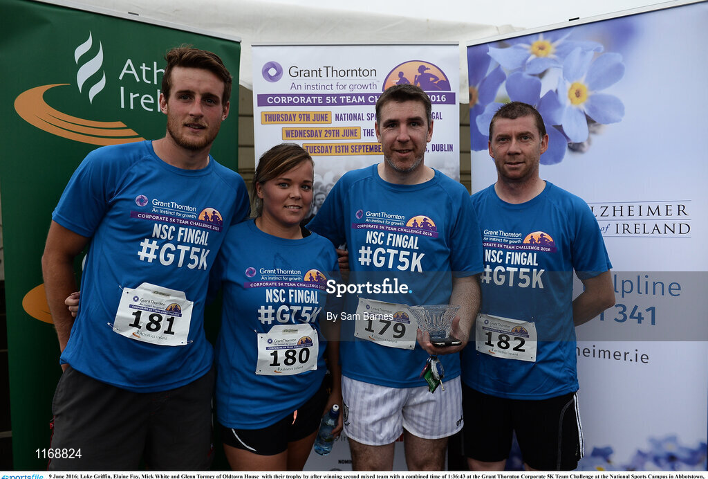 9 June 2016; Luke Griffin, Elaine Fay, Mick White and Glenn Tormey of Oldtown House  with their trophy by after winning second mixed team with a combined time of 1:36:43 at the Grant Thornton Corporate 5K Team Challenge at the National Sports Campus in Abbotstown, Dublin. Photo by Sam Barnes/Sportsfile
