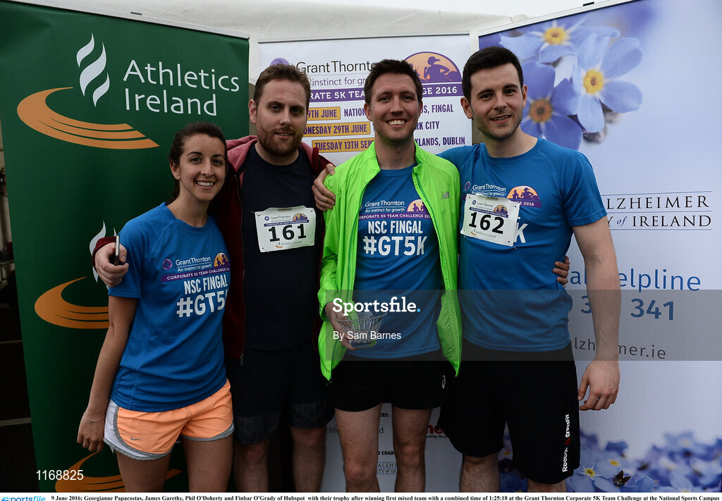 9 June 2016; Georgianne Papacostas, James Garethy, Phil O'Doherty and Finbar O'Grady of Hubspot  with their trophy after winning first mixed team with a combined time of 1:25:18 at the Grant Thornton Corporate 5K Team Challenge at the National Sports Campus in Abbotstown, Dublin. Photo by Sam Barnes/Sportsfile