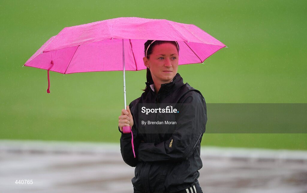 10 July 2010; Anna Boyle, Ballymena and Antrim AC, shelters from the rain while waiting her turn in the Women's Long Jump during the Woodie's DIY AAI Senior Track & Field Championships. Morton Stadium, Santry, Dublin. Picture credit: Brendan Moran / SPORTSFILE