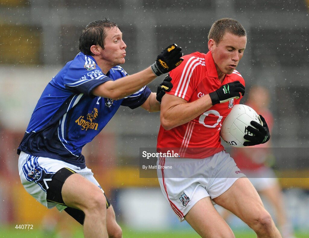 10 July 2010; Patrick Kelly, Cork, in action against Michael Hannon, Cavan. GAA Football All-Ireland Senior Championship Qualifier, Round 2, Cork v Cavan, Pairc Ui Chaoimh, Cork.  Picture credit: Matt Browne / SPORTSFILE