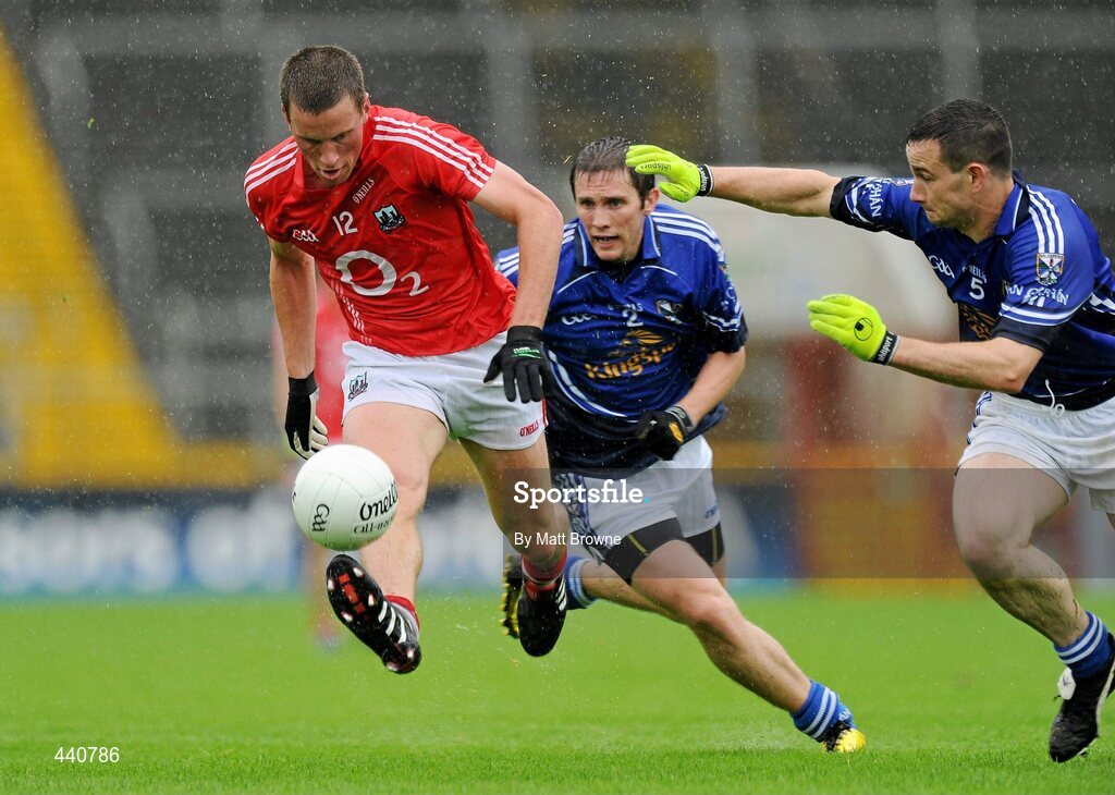 10 July 2010; Patrick Kelly, Cork, in action against Alan Clarke and Michael Hannon, 2, Cavan. GAA Football All-Ireland Senior Championship Qualifier, Round 2, Cork v Cavan, Pairc Ui Chaoimh, Cork.  Picture credit: Matt Browne / SPORTSFILE