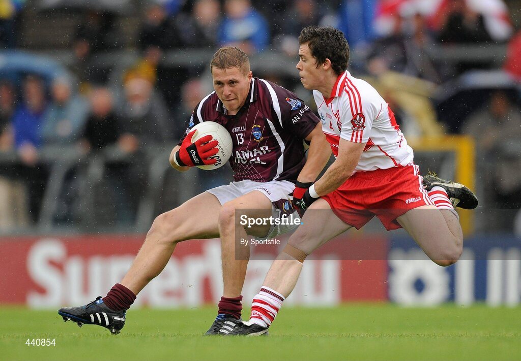 10 July 2010; Paul Greville, Westmeath, in action against Dermot McBride, Derry. GAA Football All-Ireland Senior Championship Qualifier, Round 2, Westmeath v Derry, Cusack Park, Mullingar, Co. Westmeath. Photo by Sportsfile
