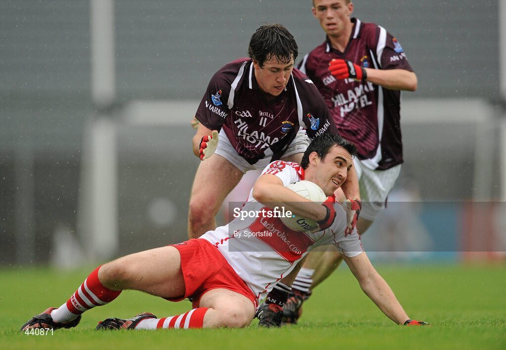 10 July 2010; Kevin McGuckin, Derry, in action against Conor Lynam, Westmeath. GAA Football All-Ireland Senior Championship Qualifier, Round 2, Westmeath v Derry, Cusack Park, Mullingar, Co. Westmeath. Photo by Sportsfile