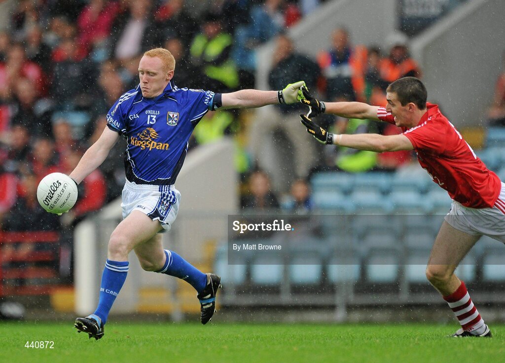 10 July 2010; Cian MacKey, Cavan, in action against Ray Carey, Cork. GAA Football All-Ireland Senior Championship Qualifier, Round 2, Cork v Cavan, Pairc Ui Chaoimh, Cork.  Picture credit: Matt Browne / SPORTSFILE