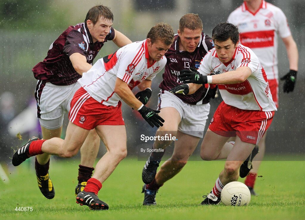 10 July 2010; Raymond Wilkinson and Dermot McBride, right, Derry, in action against Kieran Martin, left, and Paul Greville, Westmeath. GAA Football All-Ireland Senior Championship Qualifier, Round 2, Westmeath v Derry, Cusack Park, Mullingar, Co. Westmeath. Photo by Sportsfile